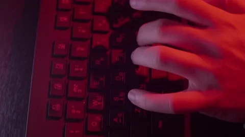 The programmer's hands quickly type on the keyboard, coding, programming, gaming Stock Footage 147668936