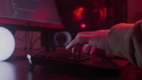 The programmer's hands quickly type on the keyboard, coding, programming Stock Footage 147669821
