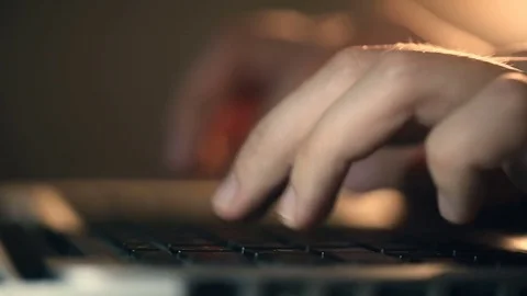 Programmer's hands typing commands on laptop keyboard. Video stock 80675477