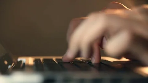 Programmer's hands typing commands on laptop keyboard. Video stock 80675483