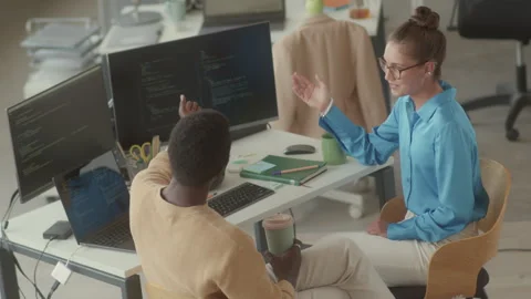 Programmers Having Coffee and Discussing Code in Office 動画素材 263730221