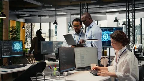 Programmers in office doing software development, brainstorming Stock Photos
