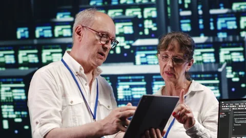 Programmers running code in data center Stock Footage 247902169