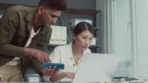 Programmers Testing New Software on Gadgets at Center Stock Footage 261664022