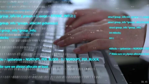 Programmers use computer keyboard typing to write hacker programming code Stock Footage 169834370