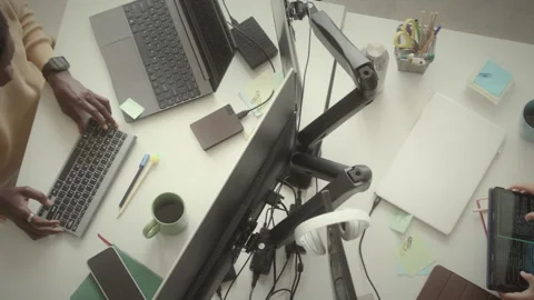 Programmers Using Digital Tablet and Computer at Office Desk Stock Footage 263725754