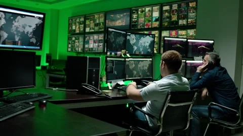 Programmers using many laptops , computers , following information, statistics . Stock Footage 163552778