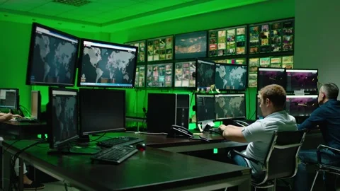 Programmers using many laptops , computers , following information, statistics . Stock Footage 163552958