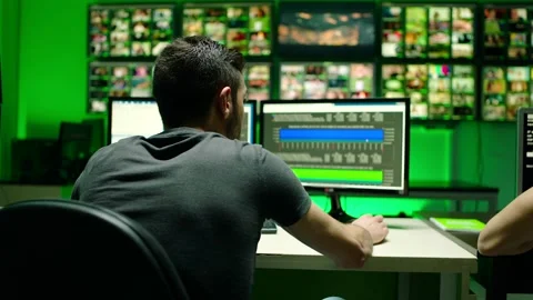 Programmers using many laptops , computers , following information, statistics . Stock Footage 163552979