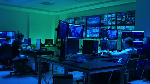 Programmers using many laptops , computers , following information, statistics . Stock Footage 163553091