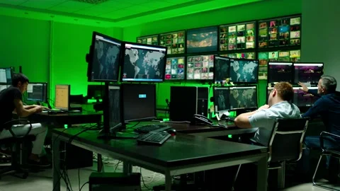 Programmers using many laptops , computers , following information, statistics . Stock Footage 163553906