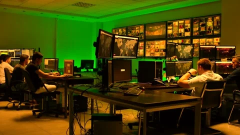 Programmers using many laptops , computers , following information, statistics . Stock Footage 163553965