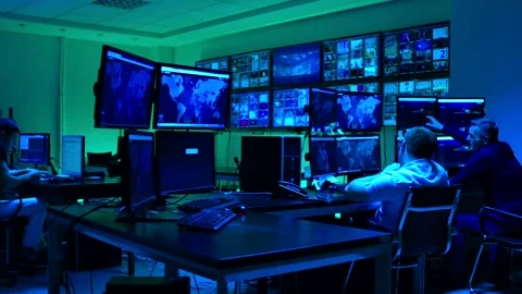 Programmers using many laptops , computers , following information, statistics . Stock Footage 163553969