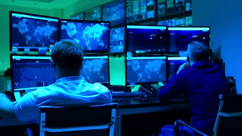 Programmers using many laptops , computers , following information, statistics . Stock Footage 163554191