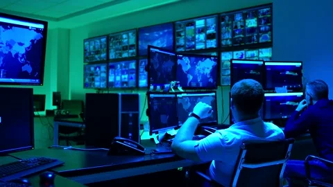 Programmers using many laptops , computers , following information, statistics . Stock Footage 163554379