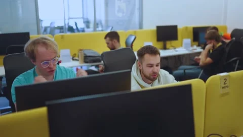 Programmers work in the office, programmers' office, it specialists Video stock 239485734