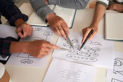 Programmers working on algorithm Stock Photos