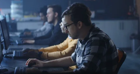 Programmers working in a common office Stock Footage 125171157