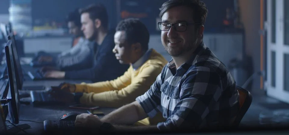 Programmers working in a common office Foto stock