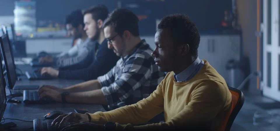 Programmers working in a common office Stock-Fotos