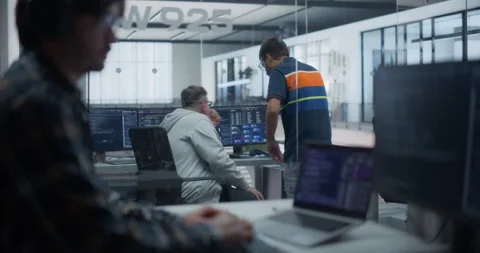 Programmers Working in Glass Office Stock Footage 296184424