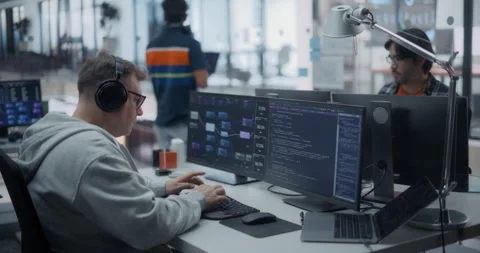 Programmers Working in Glass Office Video stock 296184958