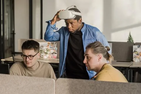 Programmers working in the office of a software development company. Coding 스톡 사진