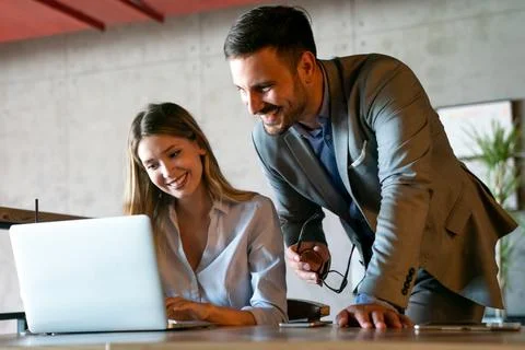Programmers working in a software developing company office Stock Photos