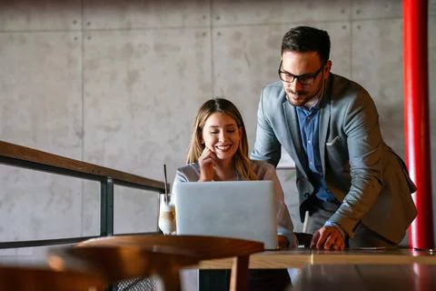 Programmers working in a software developing company office Stock Photos