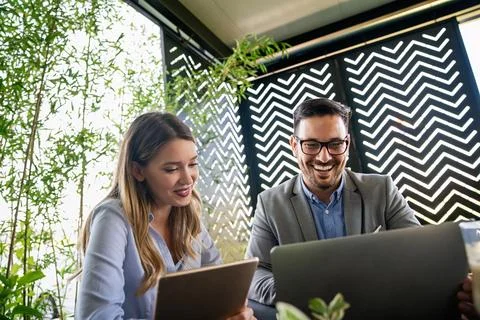 Programmers working in a software developing company office Stock Photos