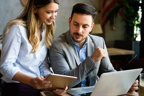 Programmers working in a software developing company office Stock Photos