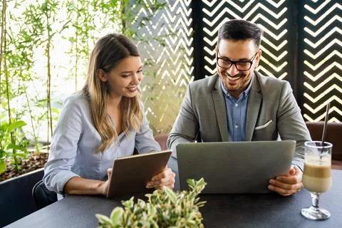 Programmers working in a software developing company office Stock Photos