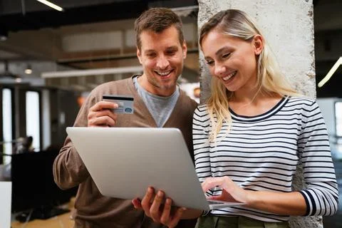 Programmers working in a software developing company office Stock Photos