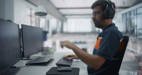 Programmers Writing Code on Computers Stock Footage 296184834