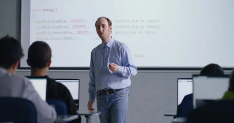 Programming And Coding Classes, Teacher Communicating With Pupils, Male IT Stock Footage 281938192