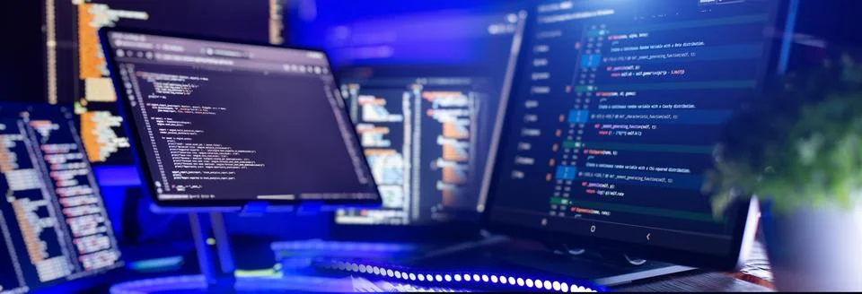 Programming and Coding Environment with Source Code, Multiple Computer Screen Фото