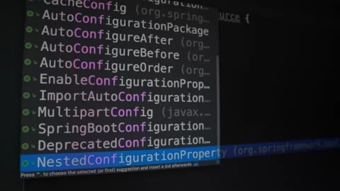 Programming and creating programs, a programmer working on a program, laying Stock Footage 142317882