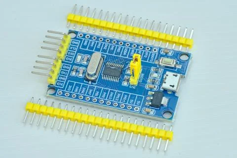 Programming board of Arduino UNO in blue colour isolated in white background Stock Photos