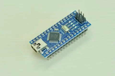 Programming board of Arduino UNO in blue colour isolated in white background Stock Photos