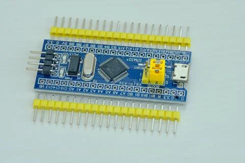 Programming board of Arduino UNO in blue colour isolated in white background Stock Photos