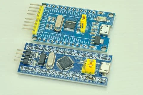 Programming board of Arduino UNO in blue colour isolated in white background Stock Photos