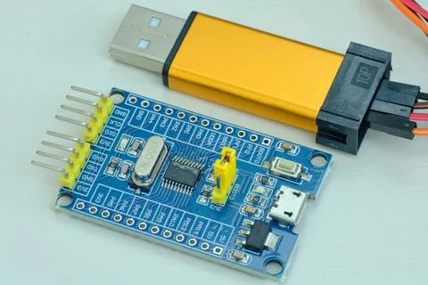 Programming board of Arduino UNO in blue colour isolated in white background Stock Photos