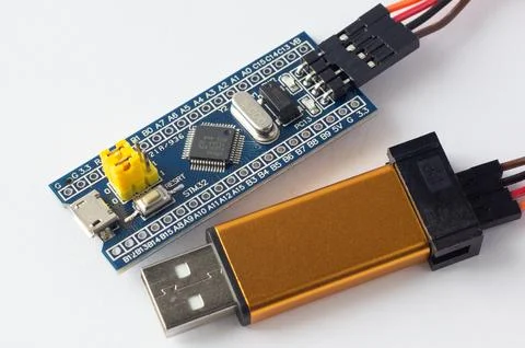 Programming board of STM32 in blue colour isolated in white background Fotos de archivo