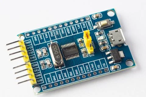 Programming board of STM32 in blue colour isolated in white background Stock Photos