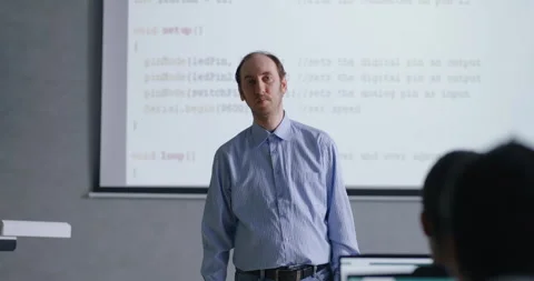 Programming Classes For Students And Schoolchildren, Male Teacher Speaking In Stock Footage 281938822