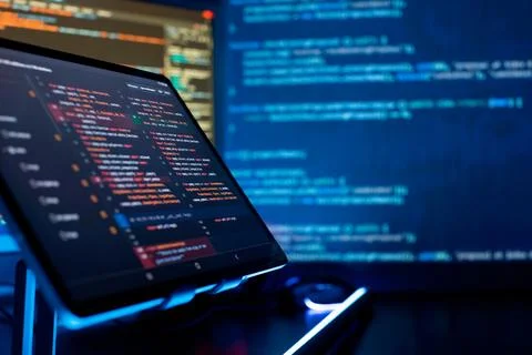 Programming code abstract screen of software developer. Coding script text .. Stock Photos