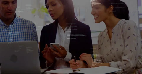 Programming code animation over business people collaborating with laptop and Stock Footage 303739873