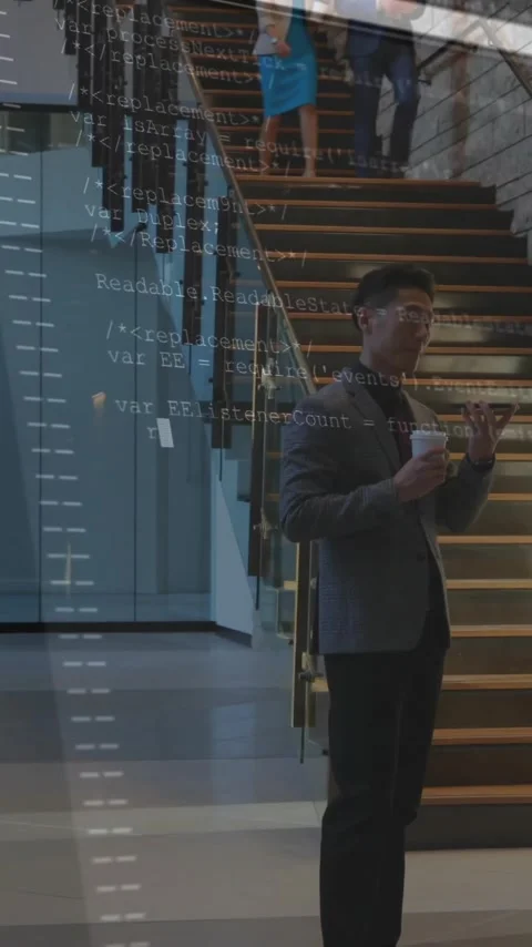 Programming code animation over business people in modern office building 動画素材 342916122