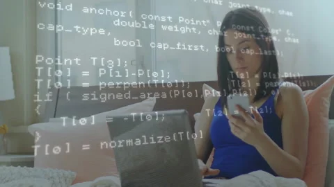Programming code animation over woman using smartphone and laptop in bed Stock Footage 306340445