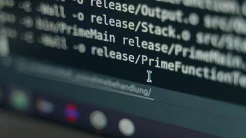 Programming Code Appearing on a Dark Computer Monitor Screen in Terminal Stockbeeldmateriaal 331164627